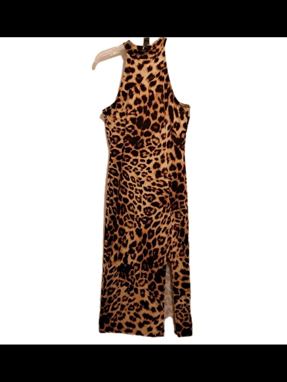 Leopard print halter turtleneck midi dress with a side slit.  Size Medium